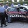 Alili Abdul sale nell'auto dei carabinieri che lo portano in carcere a Camerino