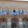 Lo striscione esposto dai tifosi rossoblu sotto al palazzo comunale