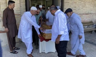 uscita-del-feretro-di-Saif-Ullah-obitorio-macerata