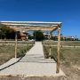 Parco di via Marinetti:  nuovi sentieri nel verde  e un gazebo con le panchine