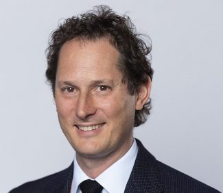 JohnElkann_cropped-e1786020256217-325x282