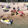 Bagnante sbatte contro gli scogli,  si attiva la macchina dei soccorsi:  l’esercitazione in spiaggia (Foto)